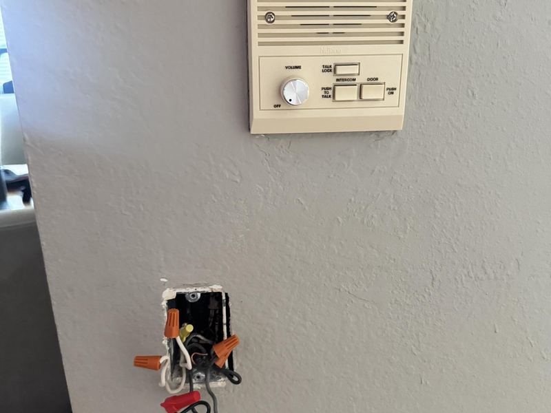 Light switch box being rewired after a DIY install in Bellevue