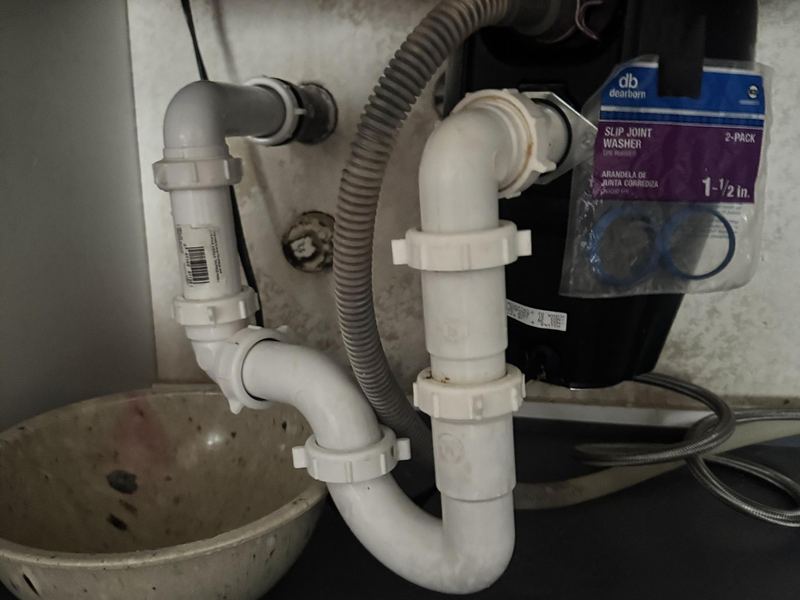 New sink waste line installed under a sink in Bothell