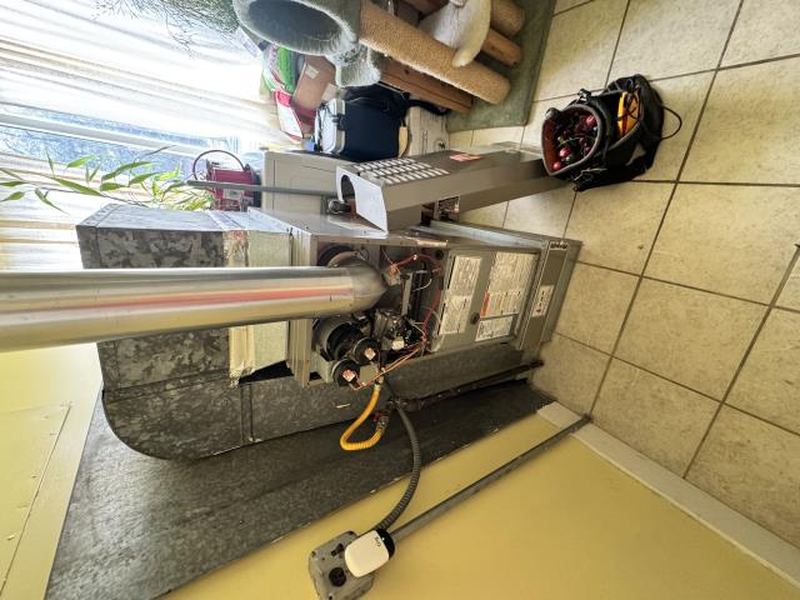 High-efficiency gas furnace installation in a Seattle home